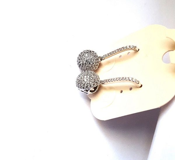 Ladies small silver round drop down earrings easy and comfortable to wear best gift to offer to female friends and are durable