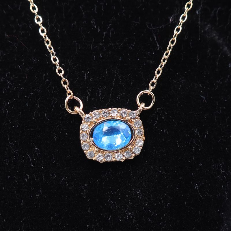Elegant Multi-Layered Gold Necklace With Blue Gem Pendant. Designed To Enhance Any Outfit, This Piece Is Perfect For Formal Occasions, Casual Wear, Or As A Statement Accessory
