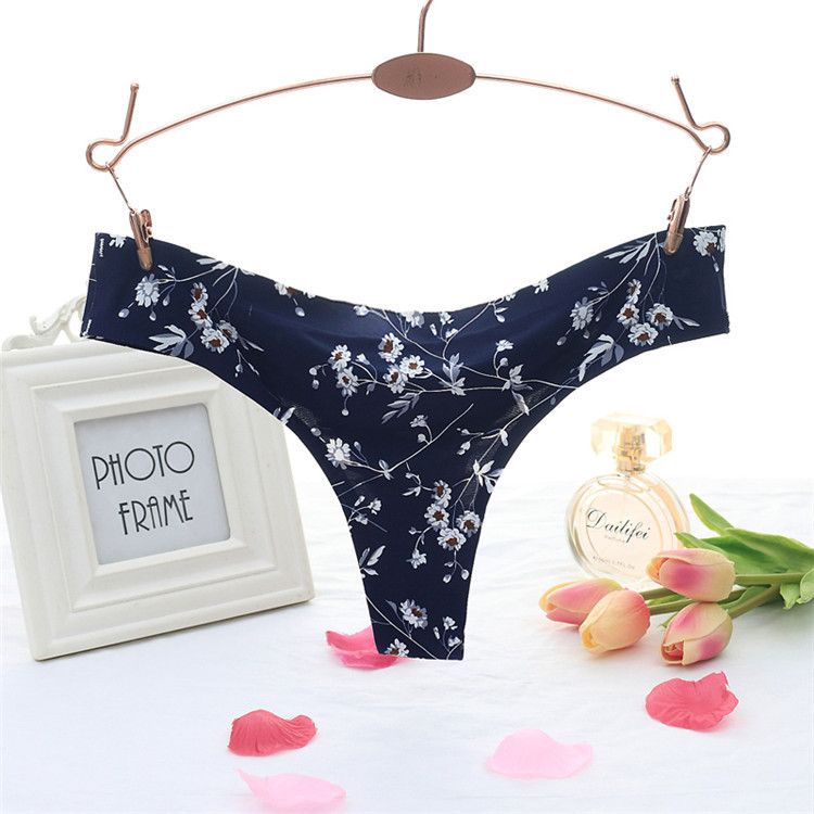 Women's one-piece printed seamless adhesive underwear sexy little fresh style low-waisted ice silk thong