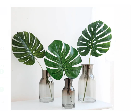 Artificial Monstera leaf- Bring the Tropics Home: Our lifelike artificial monstera leaf transport you straight to a lush jungle paradise