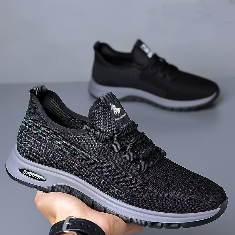 Running shoes with fly woven mesh surface, breathable and lightweight casual shoes, simple black, fashionable and trendy sports shoes.