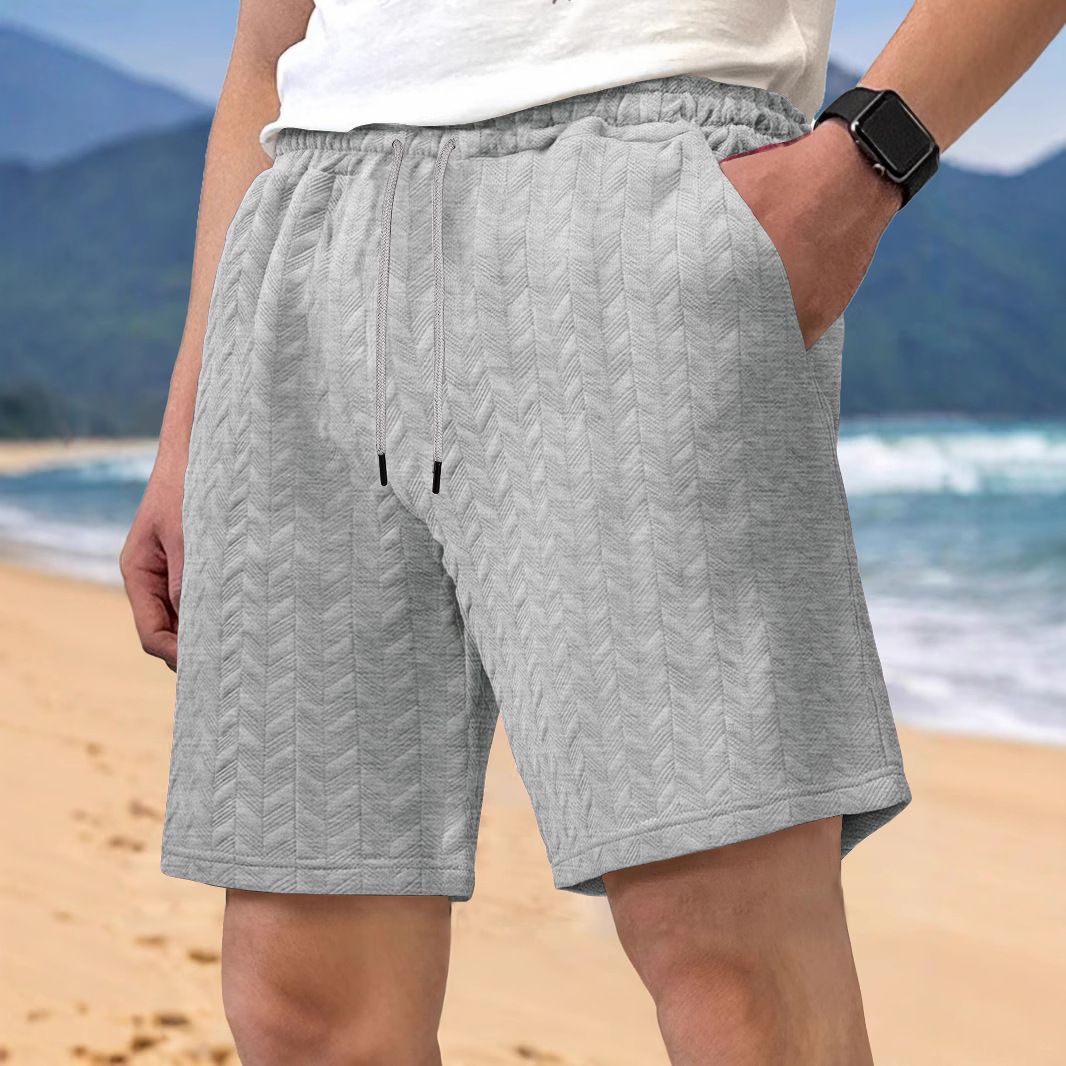 Clothes > Men's Clothing > Bottoms > Shorts  European and American men's summer loose solid color shorts jacquard lace men's casual shorts beach pants