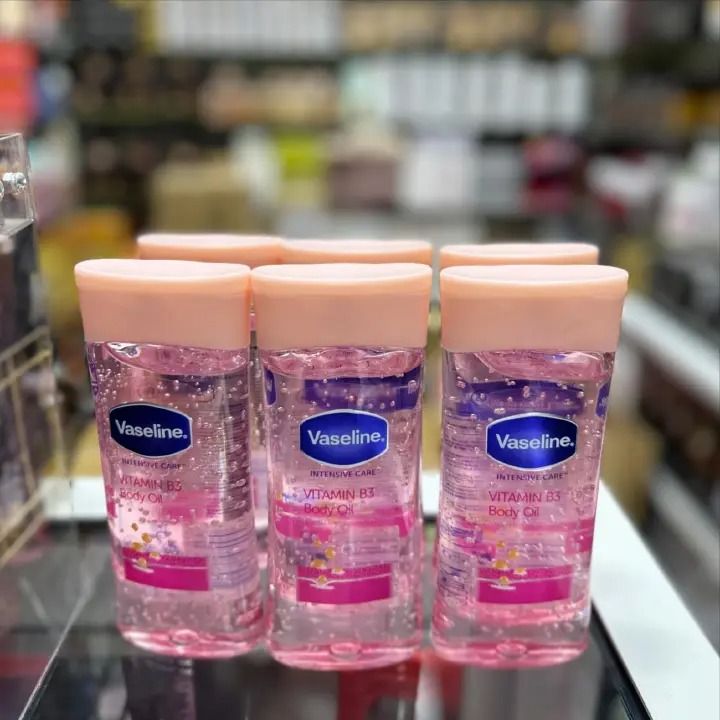 3 Packs Vaseline VITAMIN B3 Intensive Care Body Oil Glowing Skin 3 As Picture Count Body Gel Oil Body Oil Made with 100% Pure Cocoa Butter + Replenishing Oils 6.8oz