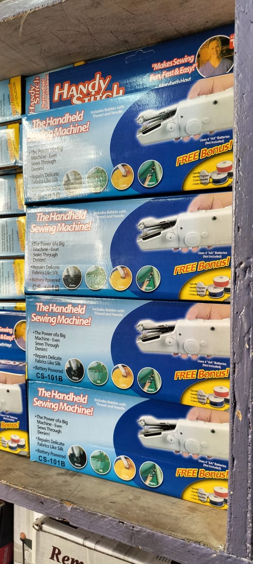 Handheld sewing machine