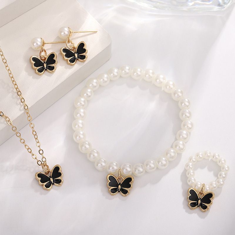 4-Piece Women's Fashion Imitation Pearl Butterfly Jewelry Set Oil Drop Butterfly Charm Bracelet Earrings Necklace Girls Jewelry Gift