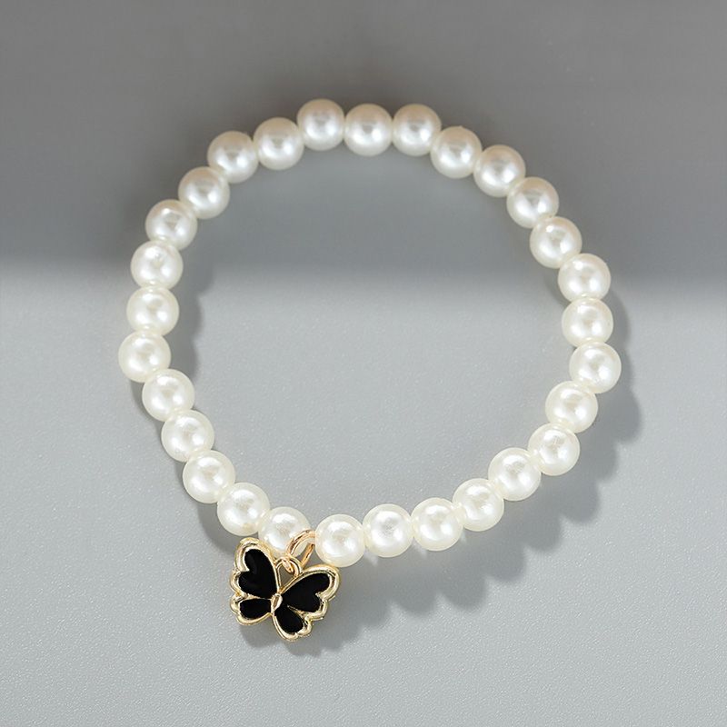 4-Piece Women's Fashion Imitation Pearl Butterfly Jewelry Set Oil Drop Butterfly Charm Bracelet Earrings Necklace Girls Jewelry Gift