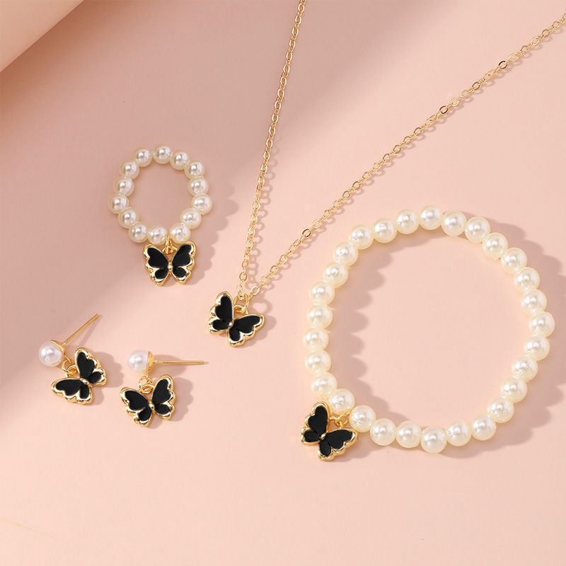 4-Piece Women's Fashion Imitation Pearl Butterfly Jewelry Set Oil Drop Butterfly Charm Bracelet Earrings Necklace Girls Jewelry Gift