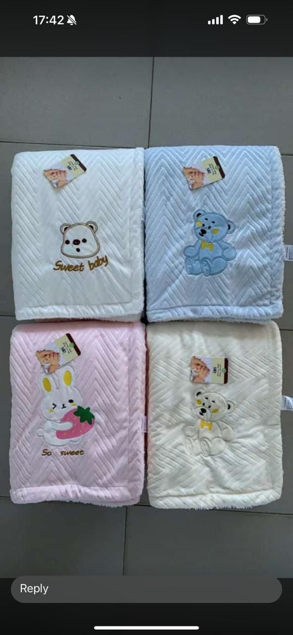 BABY SHAWLS. They are typically made from ultra-soft, warm fleece fabrics to provide comfort and warmth for newborns.
