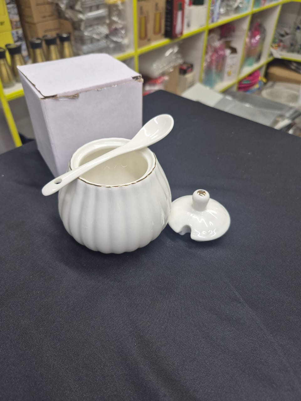 Gold Rimmed Ceramic Sugar Dish with Spoon, Elegant Tabletop Sugar Bowl for Tea, Coffee, and Dining Use, Stylish and Practical Kitchen or Dining Accessory