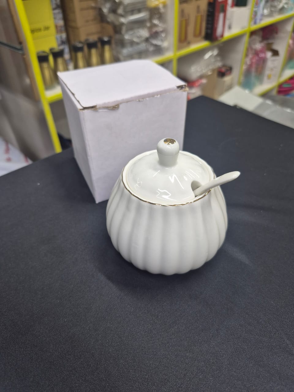 Gold Rimmed Ceramic Sugar Dish with Spoon, Elegant Tabletop Sugar Bowl for Tea, Coffee, and Dining Use, Stylish and Practical Kitchen or Dining Accessory