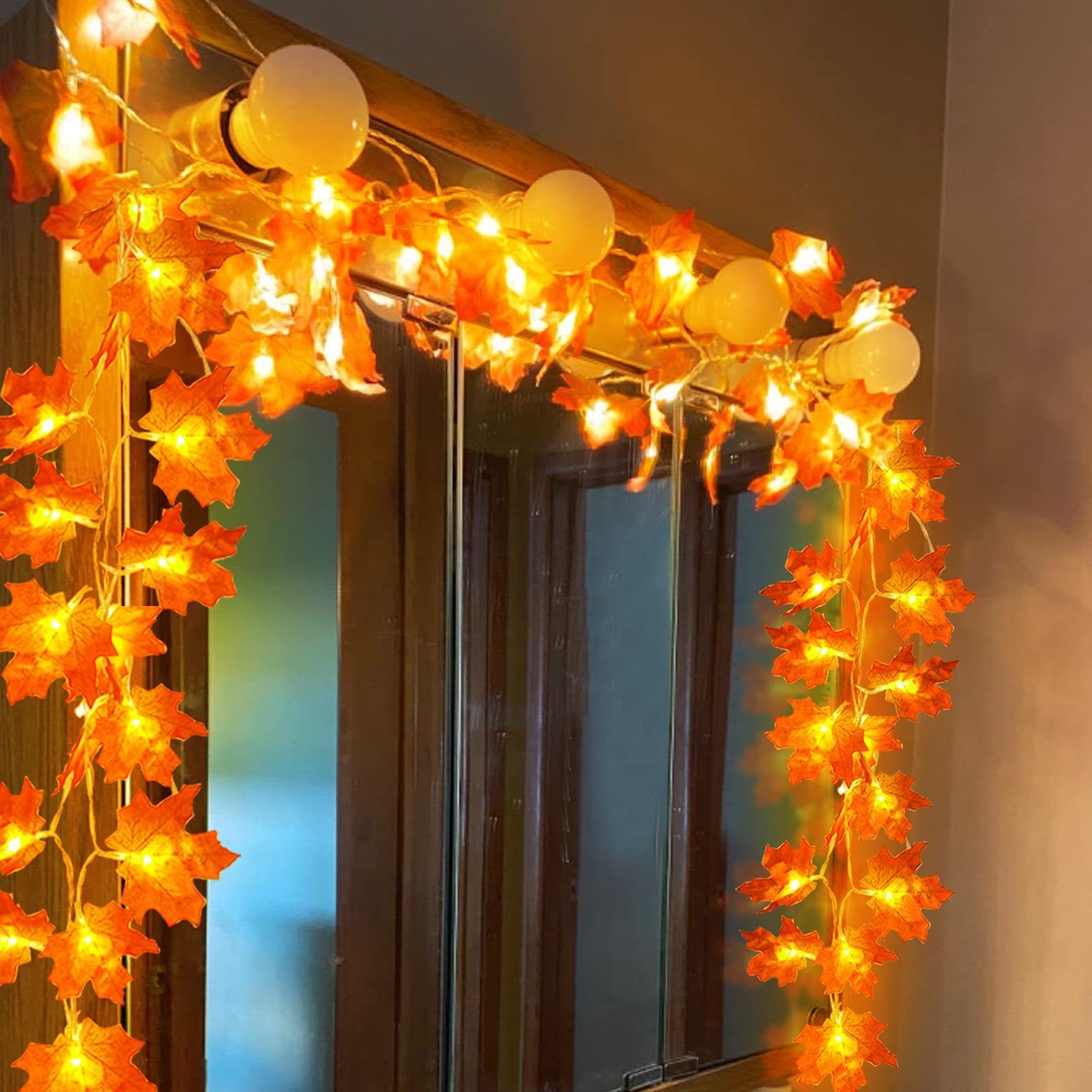 LED string lights with simulated maple leaf lights, perfect for autumn harvest, Thanksgiving, and Halloween decorations. Battery-powered string lights.