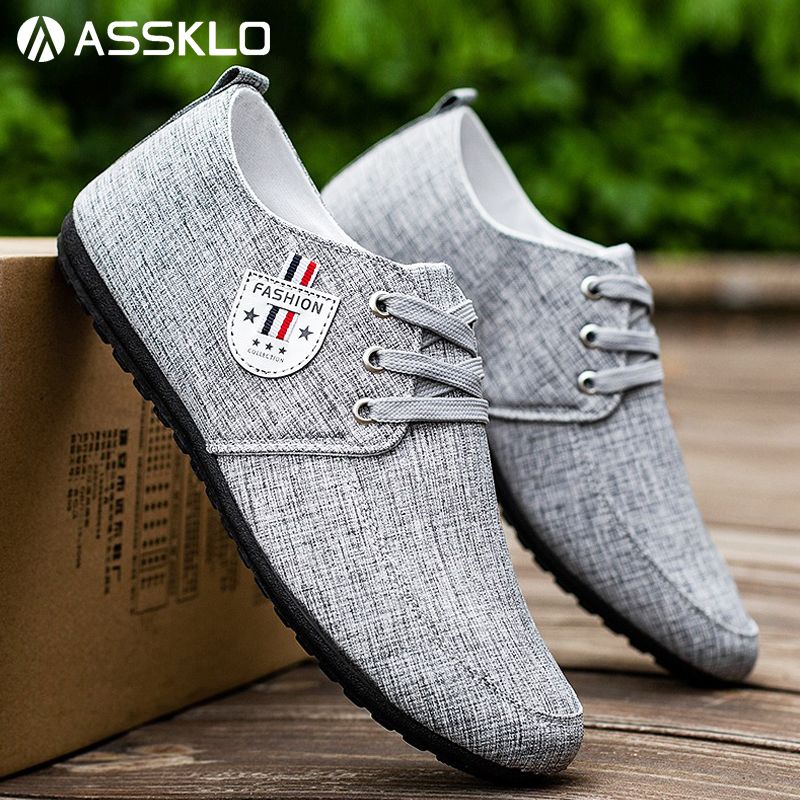 ASSKLO Breathable and lightweight canvas shoes, trendy soft soled men's shoes, bean shoes, slip on feet, lazy shoes, and youth trendy shoes