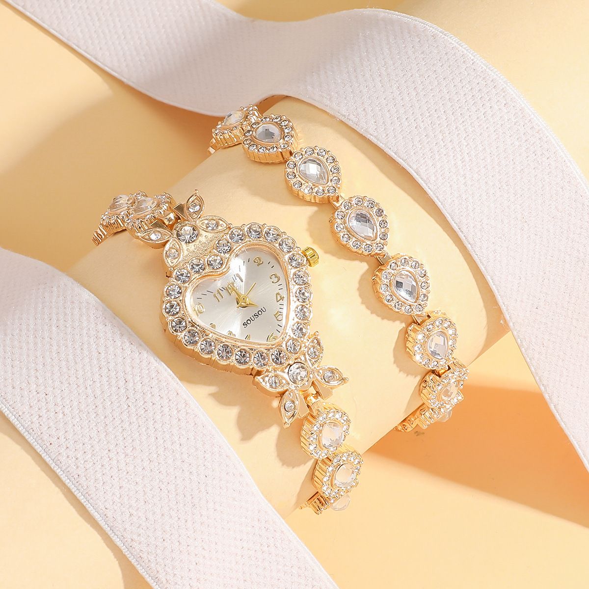 Ladies' heart-shaped case, dot scale dial diamond-encrusted flower pattern detachable bracelet fashionable heart-shaped watch