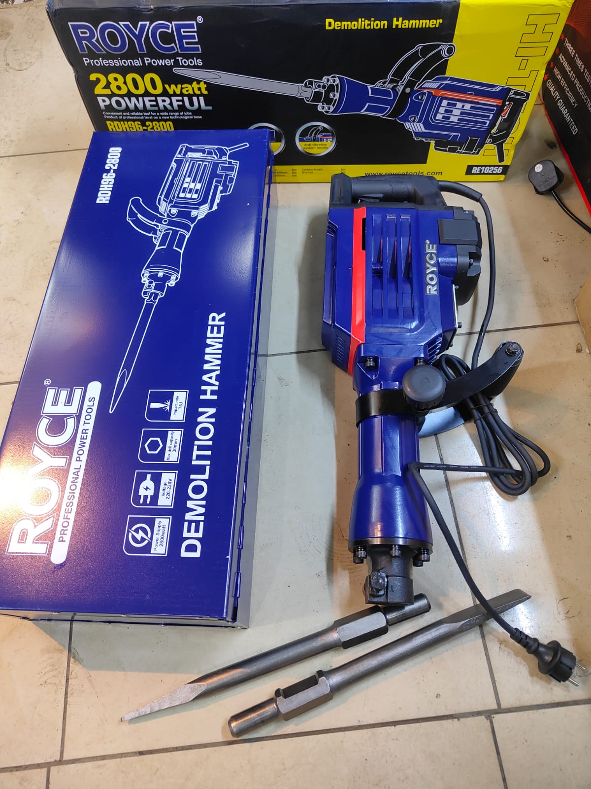 Royce demolition hammer drill now available 2800 watts Heavy duty 75 joules impact rate With two bits