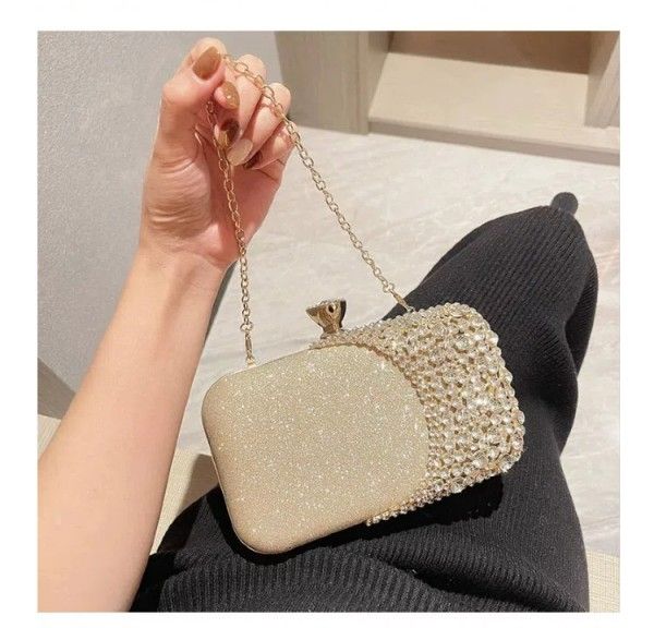 Socialites Lined Up For A Party, Wearing Diamond-Encrusted Evening Gowns And Carrying Evening Bags