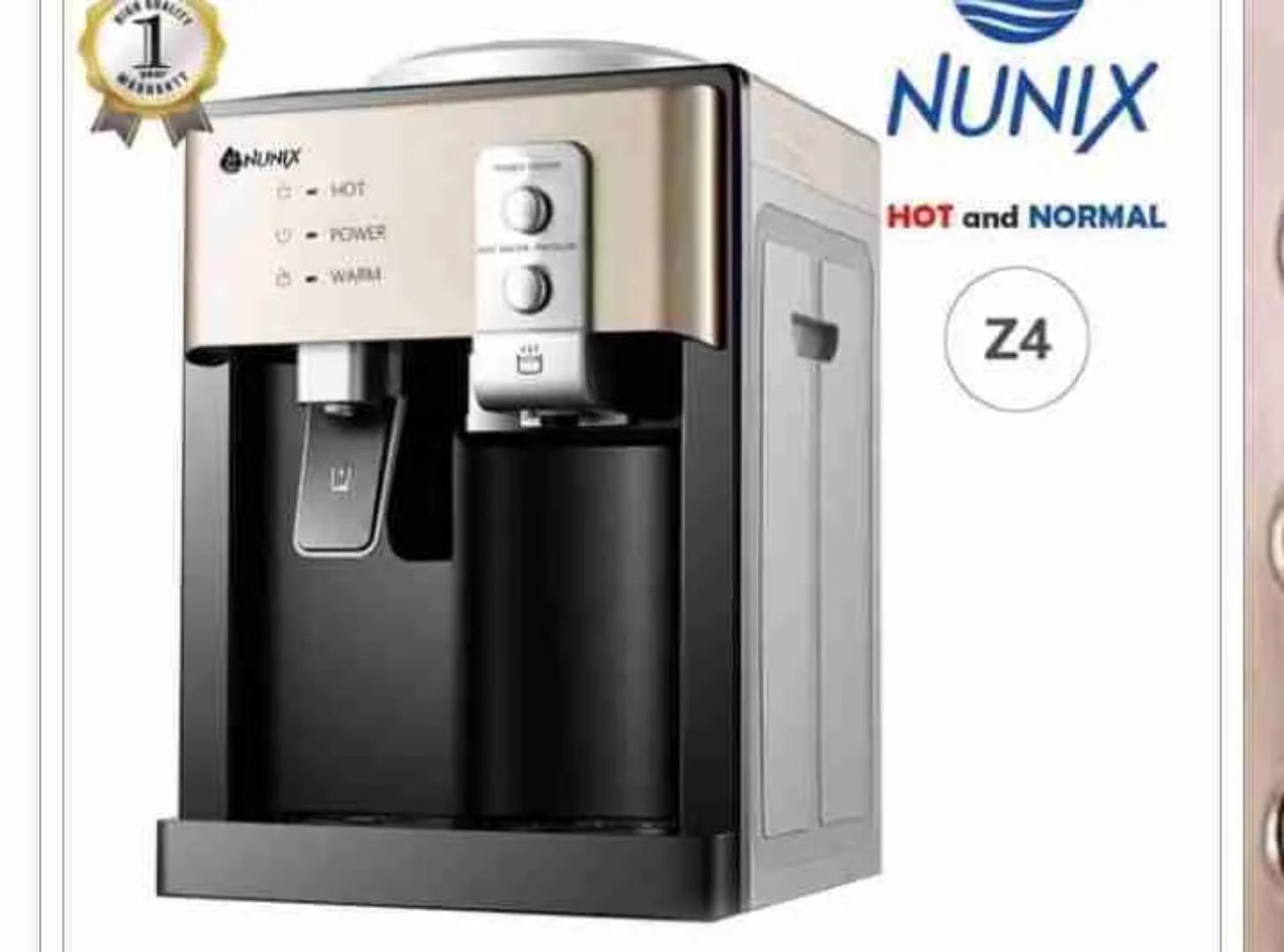 Nunix Classic Z4 Table Top Hot And Normal Water Dispenser  Hot Tank Capacity 0.7L Cold Tank Capacity 0.6L Easy To Use Press Taps Hot or normal water. Z4 nunix water dispenser