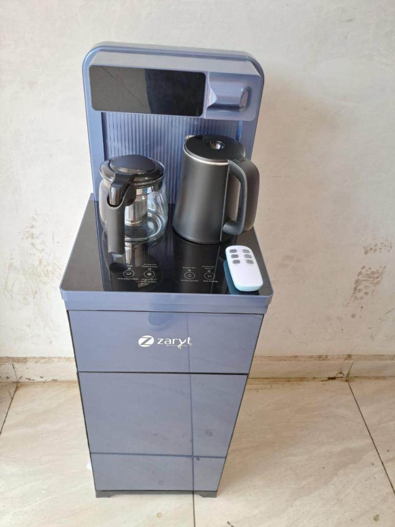 Zaryt bottom load hot and cold water dispenser with two Automatic filling kettles touch and remote control . Zaryt coffee maker bottom load water dispenser