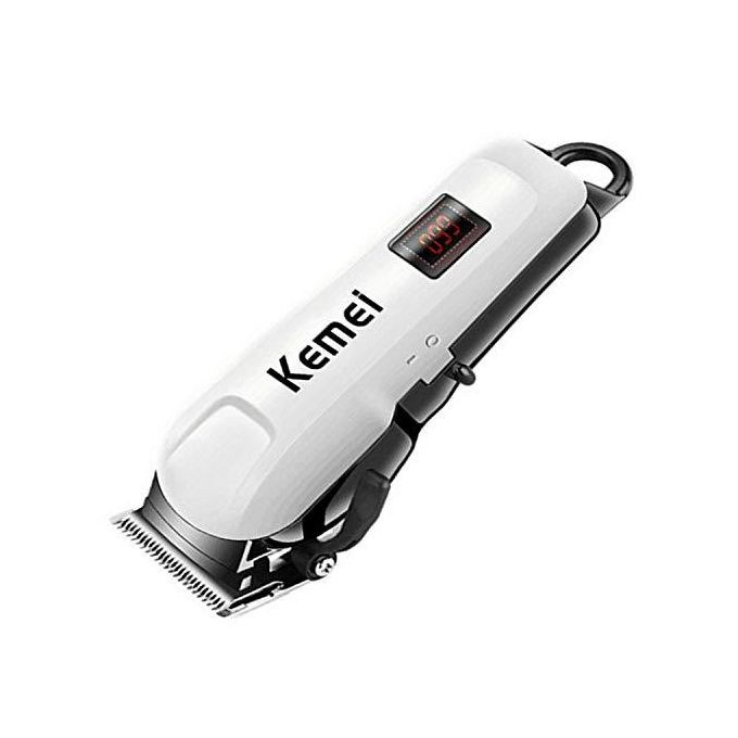 Kemei rechargeable cordless shaver with led display and 4hrs continous shaving time battery power . Kemei cordless hair clipper shaving machine