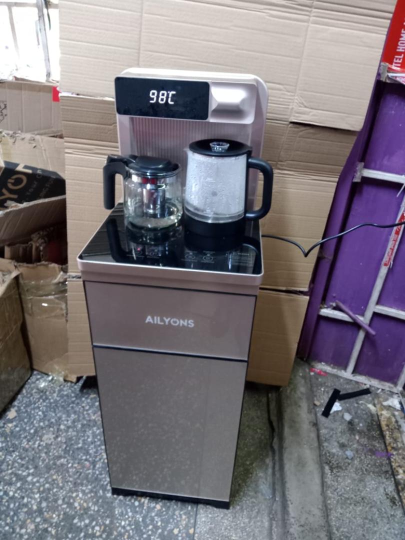 Ailyons bottom load AFK-8848 hot and cold water dispenser 500W Ailyons water dispenser with 2 free water boiling kettles for coffee making and LCD touch panel and remote control Champagne color