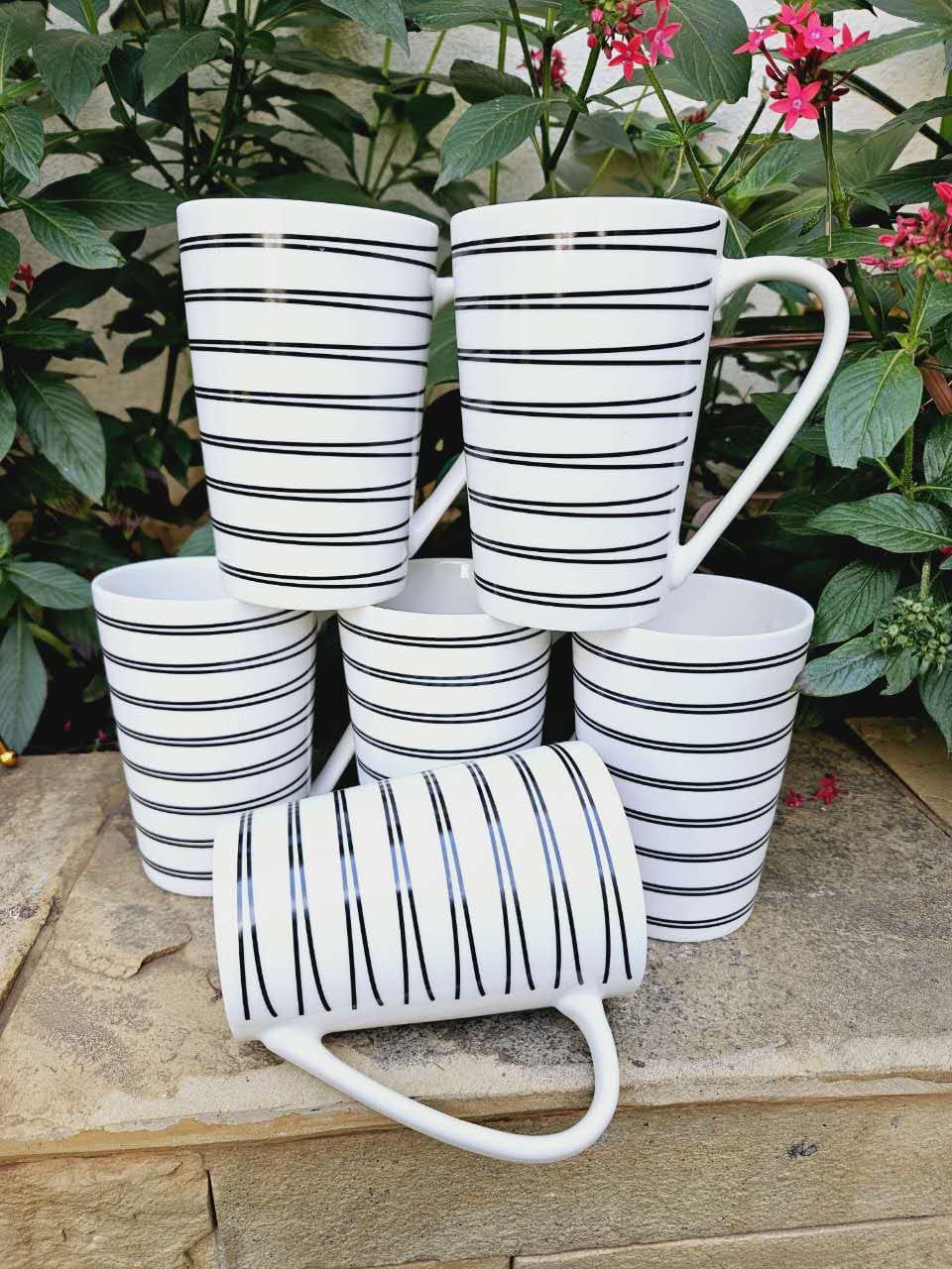 6 pieces classy mugs Strong ceramic mugs
Made with thick comfortable grip ergonomic handles
Quality Chip resistant ceramic material
Classic design fit any kitchen style