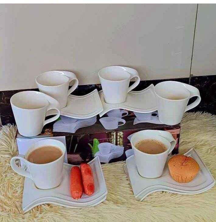 6 pieces Wavy milk cup set with saucer set Ceramic material 
Quality is guaranteed 
Perfect for Coffee, Tea, Hot Chocolate, Milk etc
Skillfully Designed to ensure a pleasant Warm hold
Perfect for gift