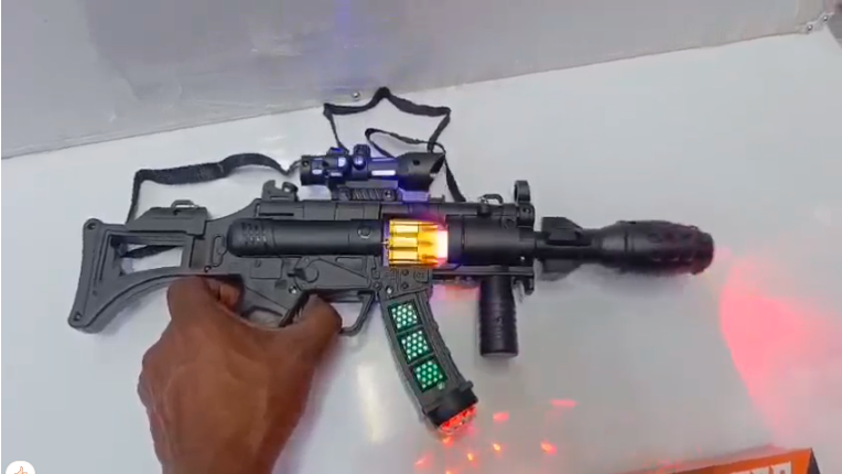 Electric Music Gun Toy with Water Spray – Battery Operated Light & Sound Blaster for Kids