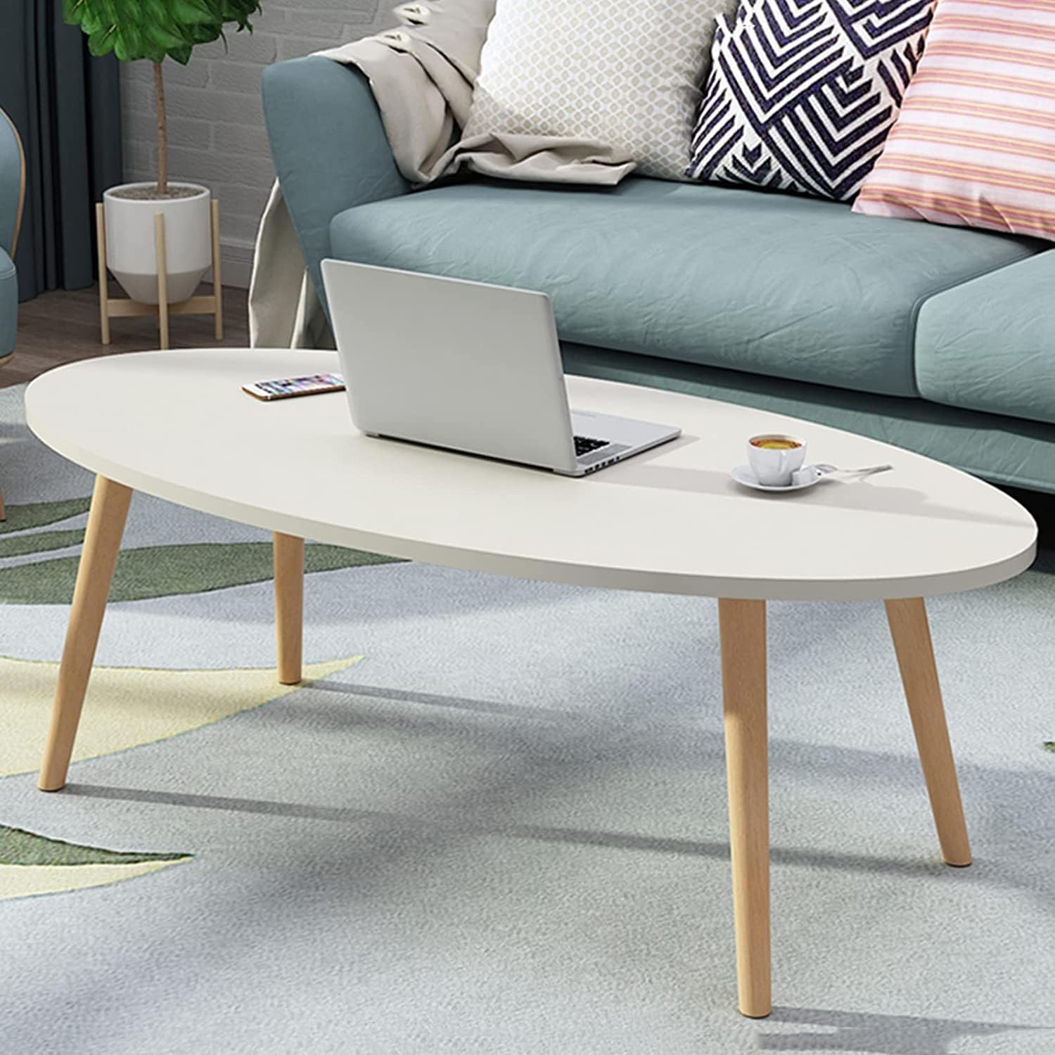 Shee Nordic Oval Coffee Table – White MDF Top with Wooden Legs for Minimalist Modern Living Rooms in Kenya