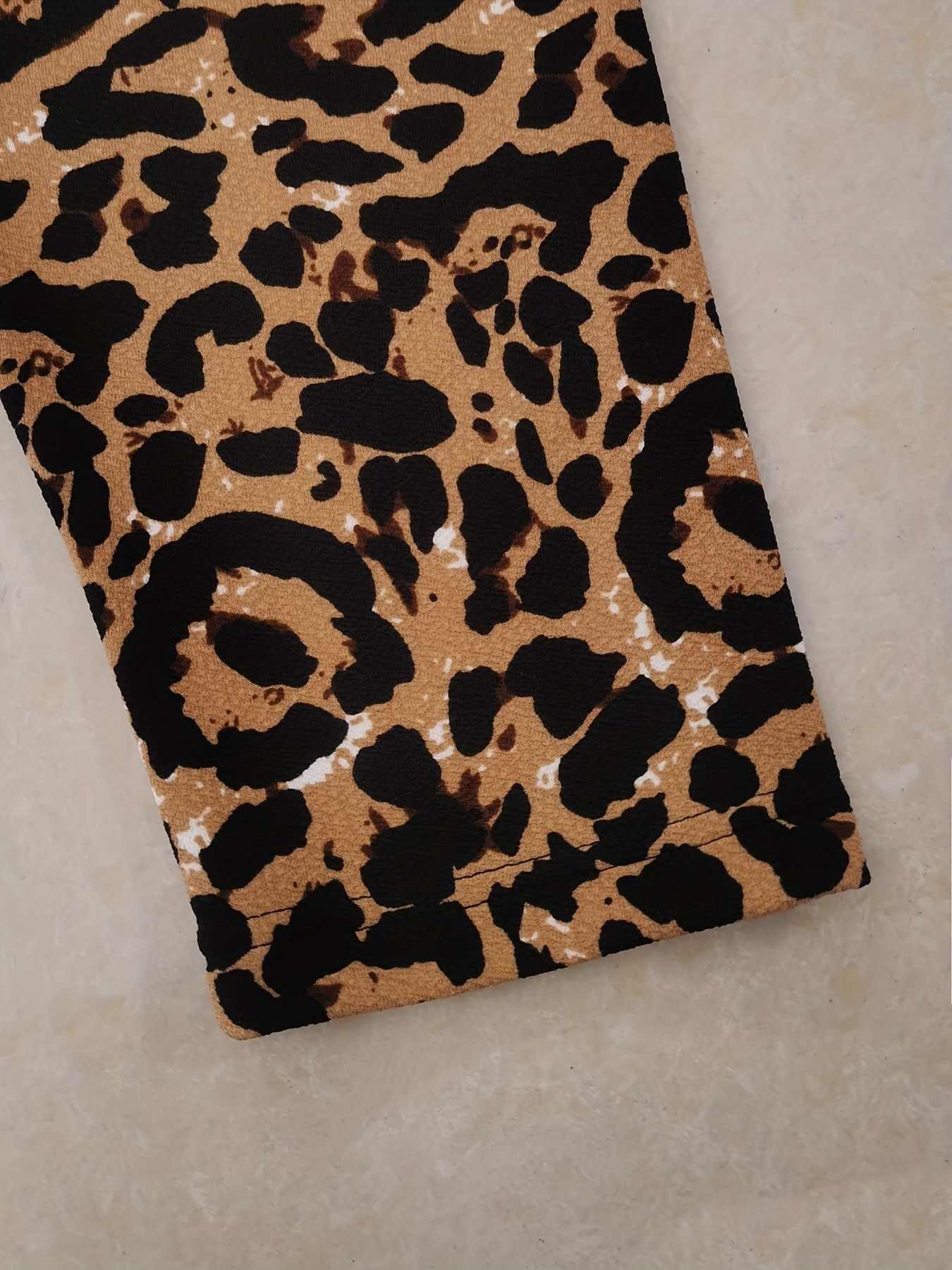 Plus size women's leopard print open top jacket