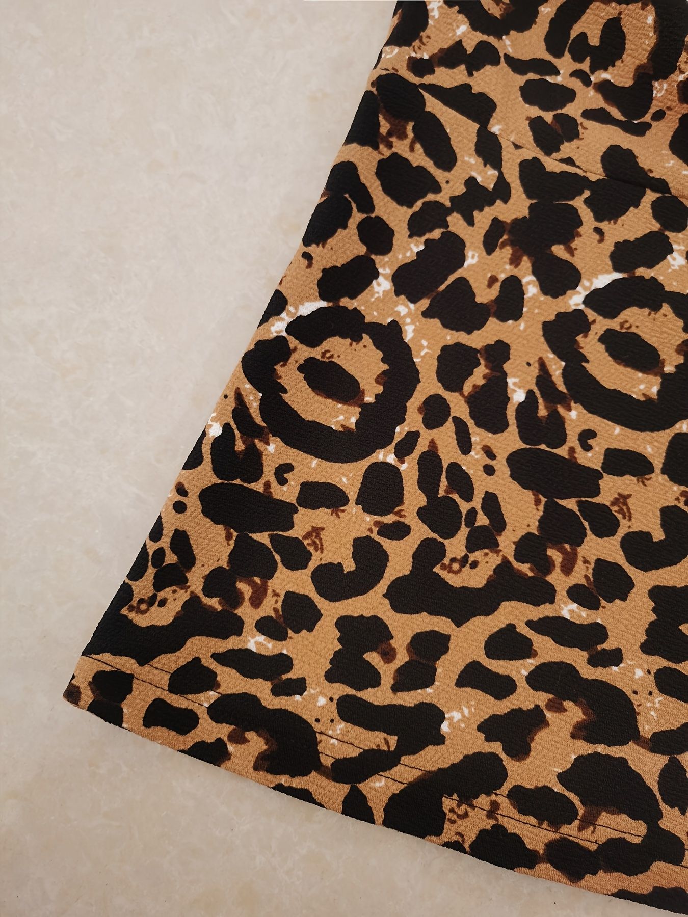 Plus size women's leopard print open top jacket