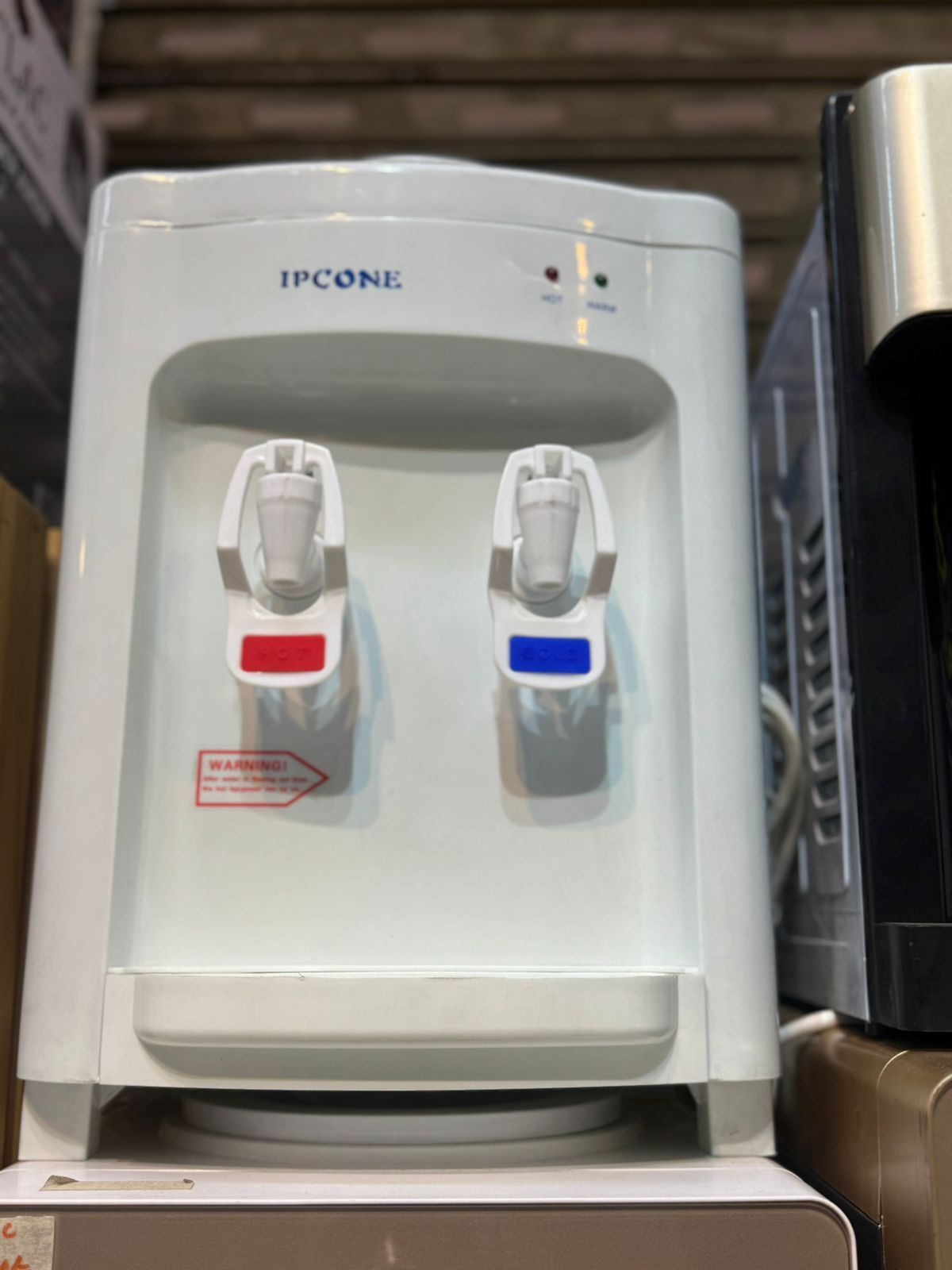 WATER DISPENSER. 2 tap ipcone water table top dispenser hot and normal, Saves on energy costs, Automatic temperature control, Durable push taps, Dry burning prevention for safety, Easy to use