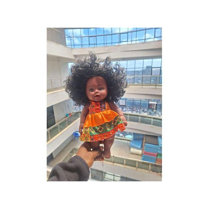 African doll with music