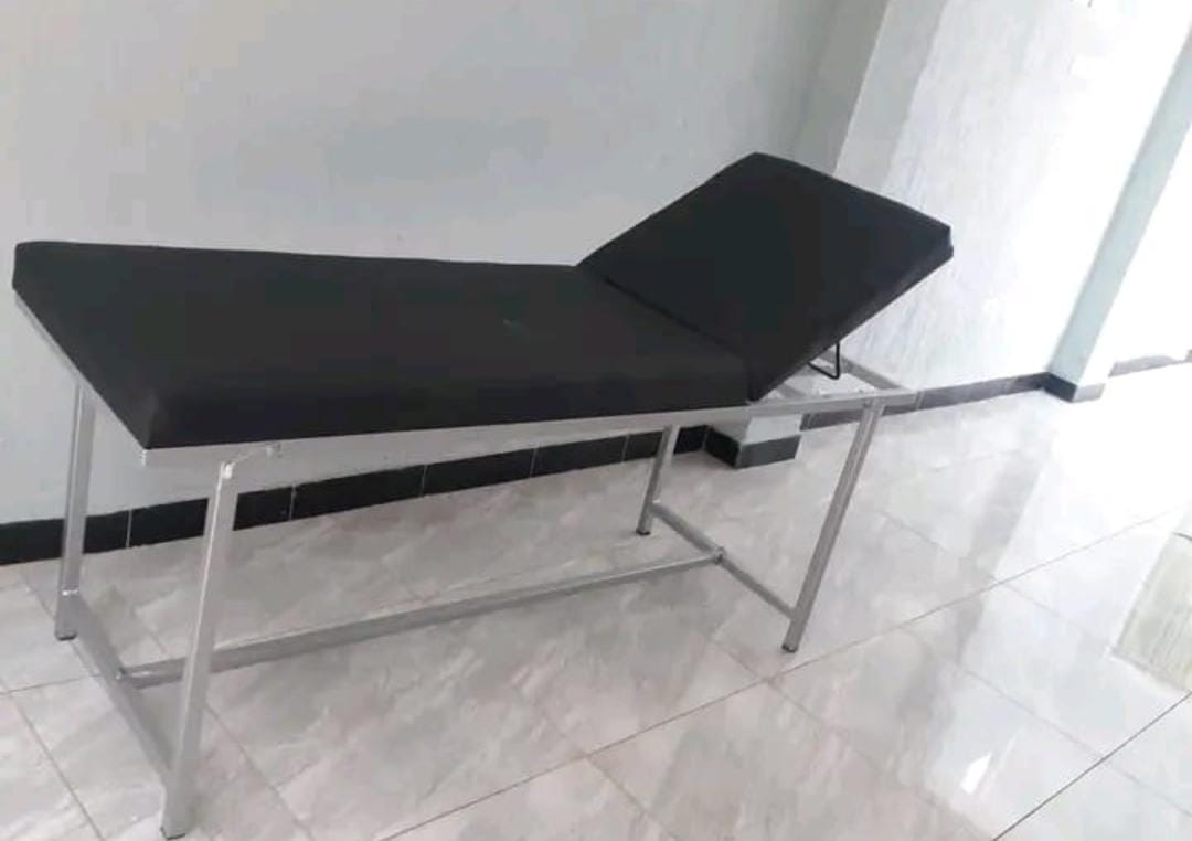 EXAMINATION COUCH. The Examination Couch is a sturdy and comfortable medical furniture unit designed to support patients during medical examinations, treatments, and minor procedures.