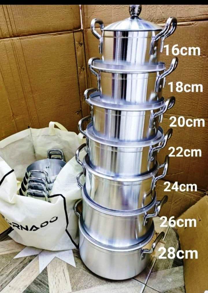 Original Tornado (TC) Cookware Set Sufuria with Free( 2 pcs Plastic service Spoons and 1 Scotch )
▪️Colour :silver 
▪️14pcs (7lids+7pots) Silver 
▪️Pot sizes (16/18/20/22/24/26/28cm)