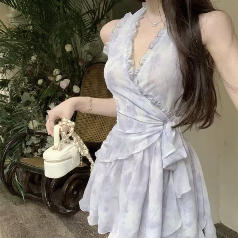 New summer French-style sleeveless dress with lotus leaf edges, featuring floral patterns, cinched waist, pure and alluring suspender design, perfect for vacations and short in length.