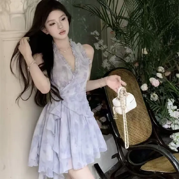 New summer French-style sleeveless dress with lotus leaf edges, featuring floral patterns, cinched waist, pure and alluring suspender design, perfect for vacations and short in length.