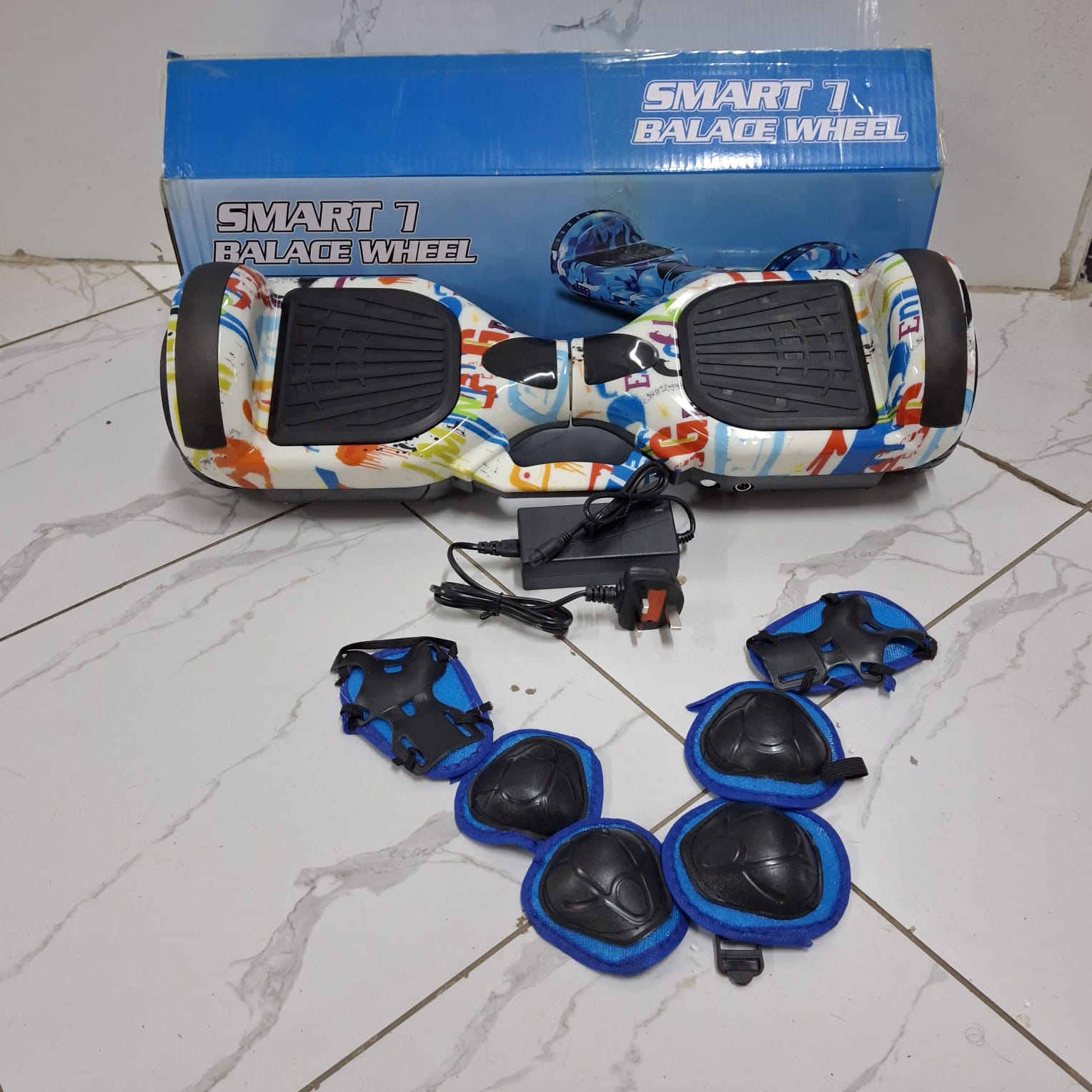 Smart 7 Hoverboard with Bluetooth – Includes Protective Gear & Charger for Safe, Fun Rides