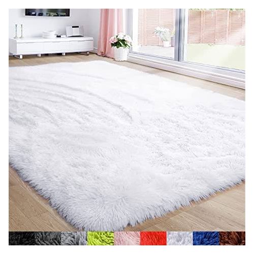 🥰🥰Fluffy plain and patched carpet size 7*8 @This woolen shag rug in cotton Fluffy material and a thick surface is the ideal carpet for your home that will give you value for your money. It is very s