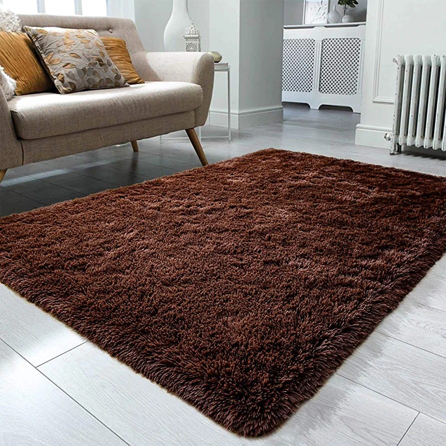 🥰🥰Fluffy plain and patched carpet size 7*8 @This woolen shag rug in cotton Fluffy material and a thick surface is the ideal carpet for your home that will give you value for your money. It is very s