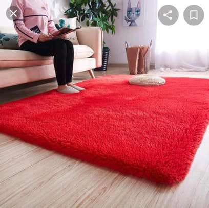 🥰🥰Fluffy plain and patched carpet size 7*8 @This woolen shag rug in cotton Fluffy material and a thick surface is the ideal carpet for your home that will give you value for your money. It is very s
