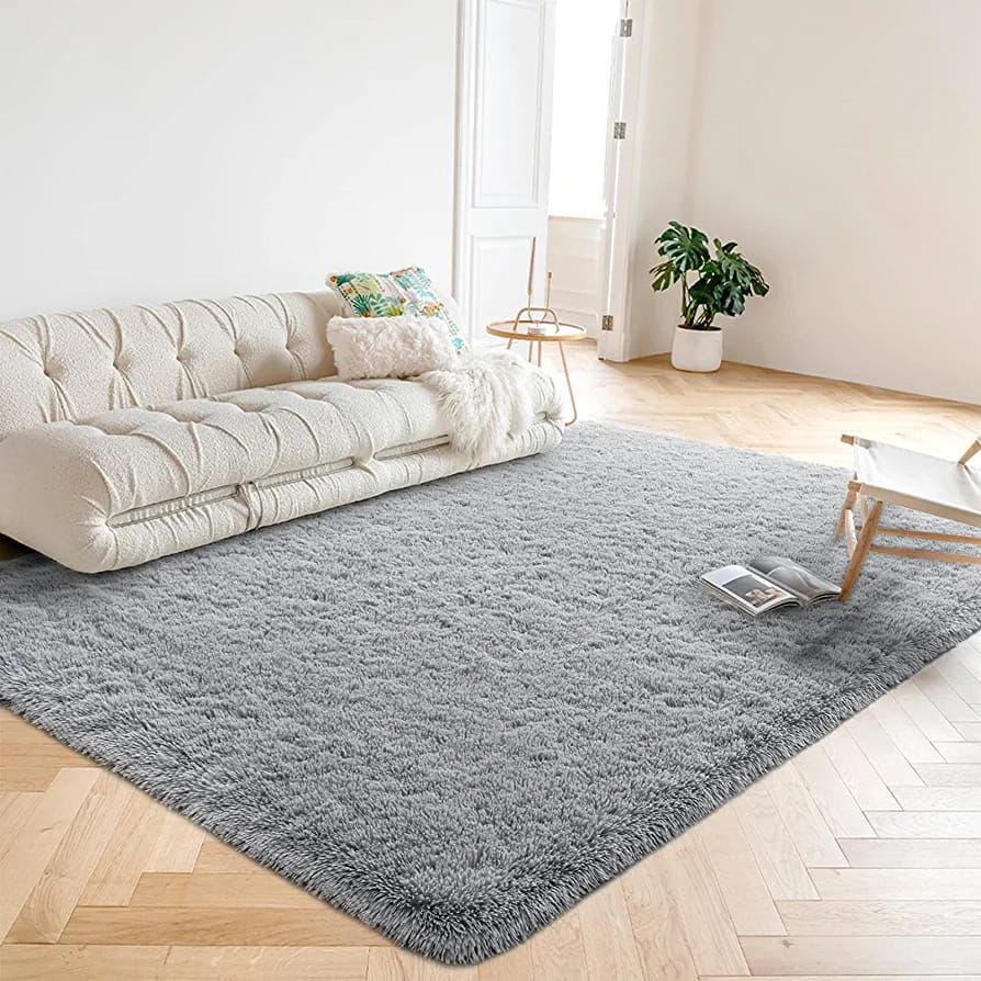 🥰🥰Fluffy plain and patched carpet size 7*8 @This woolen shag rug in cotton Fluffy material and a thick surface is the ideal carpet for your home that will give you value for your money. It is very s