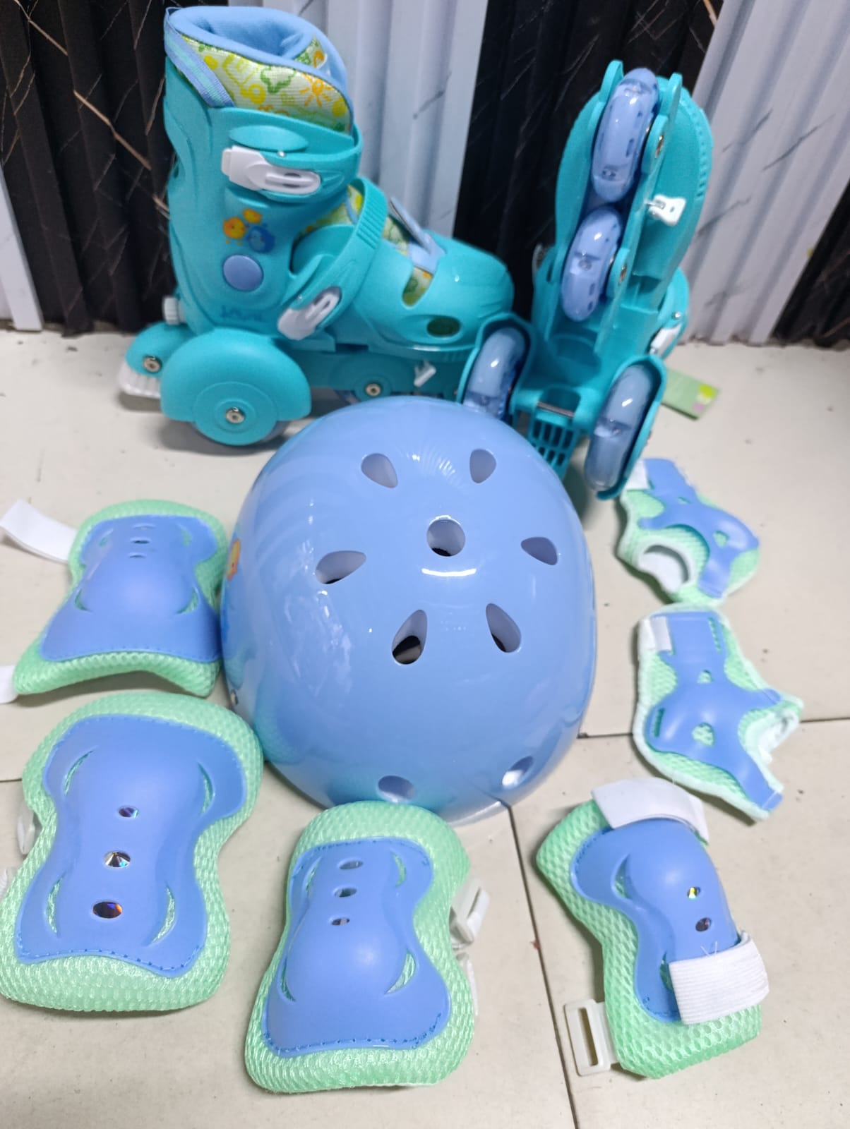 TRAINER SET. Size 26 Kids Trainers set(skate +hard helmet +guards), Has glowing wheels, Very good quality, Adjustable roller skates shoes Size,Protective lining in the skate shoes.