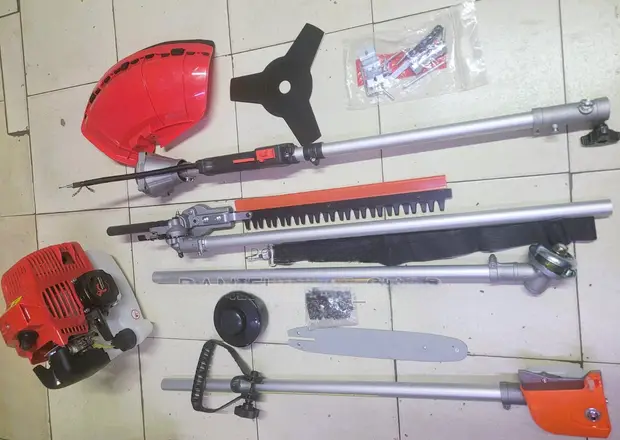 Premier 4-in-1 Multi-Function Brush Cutter – Hedge Trimmer, Chain Saw & Grass Cutter (German Technology). A versatile multi-function garden tool powered by advanced German technology.