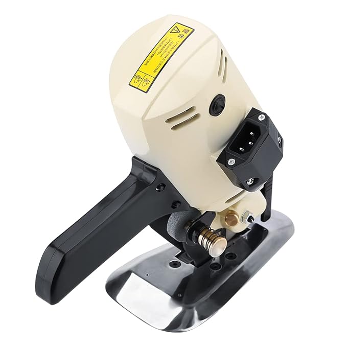 Premier Cloth Cutting Machine – Heavy-Duty Electric Fabric Cutter for Tailoring & Industrial Use. It slices through multiple fabric layers with ease—saving time while maintaining clean, accurate cut