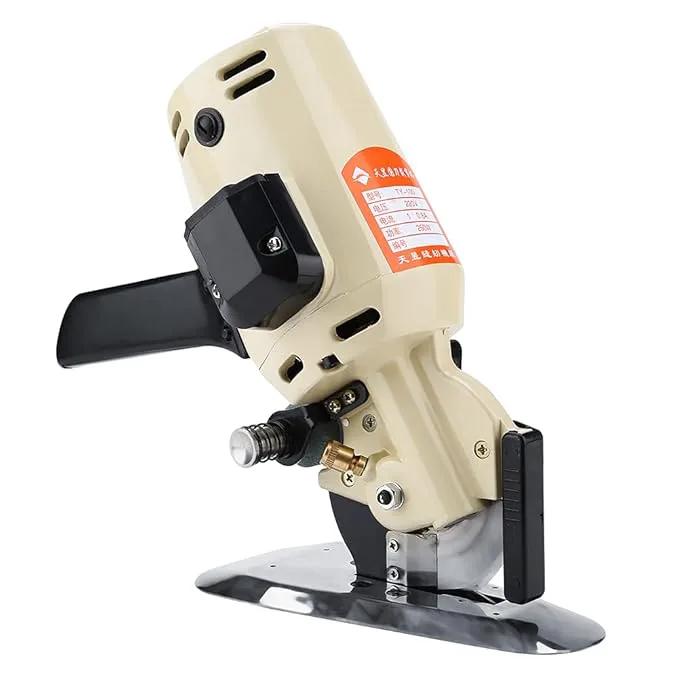 Premier Cloth Cutting Machine – Heavy-Duty Electric Fabric Cutter for Tailoring & Industrial Use. It slices through multiple fabric layers with ease—saving time while maintaining clean, accurate cut