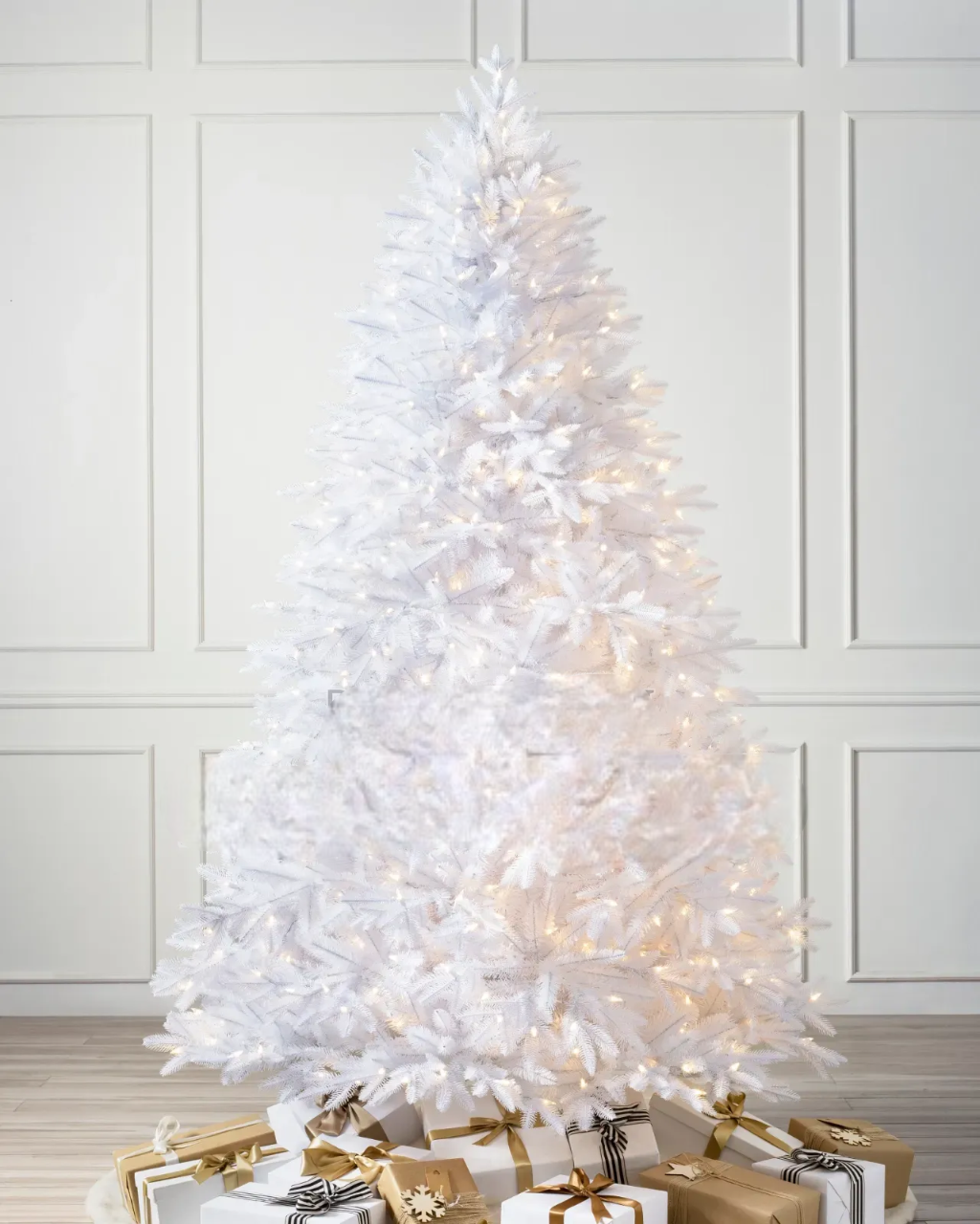 1.8M  White Christmas Tree – Full Snowy Artificial Tree with Sturdy Metal Stand Premium Dense PVC White Branches. Well-shaped silhouette that looks stunning in both minimalist & themed Christmas décor