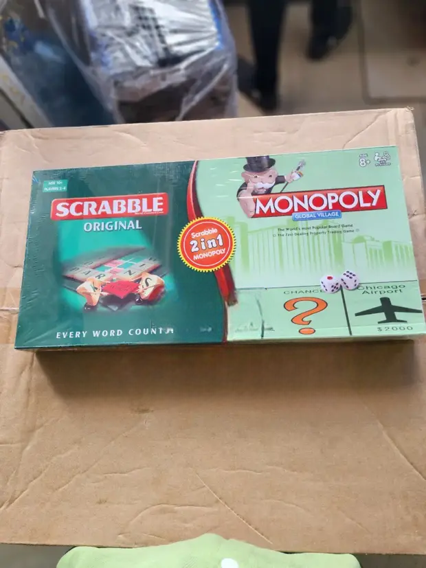 2-in-1 Monopoly & Scrabble Board Game – Classic Family Strategy & Word Game Set. Combines money strategy and word-building fun, making it perfect for family game nights, schools, and social gathering.