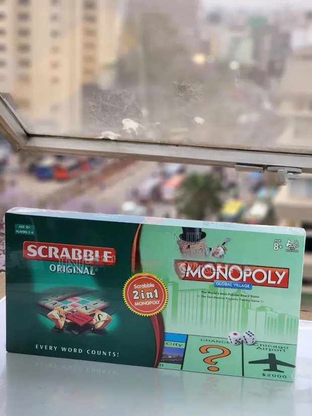 2-in-1 Monopoly & Scrabble Board Game – Classic Family Strategy & Word Game Set. Combines money strategy and word-building fun, making it perfect for family game nights, schools, and social gathering.