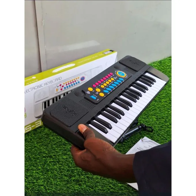 Electronic Keyboard Piano with Charging Cable & Microphone – Rechargeable Digital Keyboard for Kids & Beginners. A versatile and beginner-friendly digital keyboard designed for learning, practice.