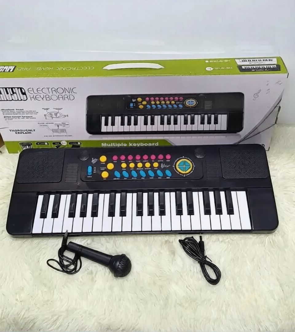 Electronic Keyboard Piano with Charging Cable & Microphone – Rechargeable Digital Keyboard for Kids & Beginners. A versatile and beginner-friendly digital keyboard designed for learning, practice.