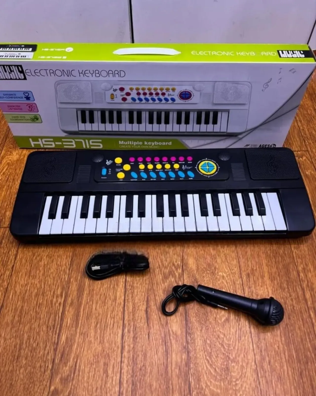 Electronic Keyboard Piano with Charging Cable & Microphone – Rechargeable Digital Keyboard for Kids & Beginners. A versatile and beginner-friendly digital keyboard designed for learning, practice.